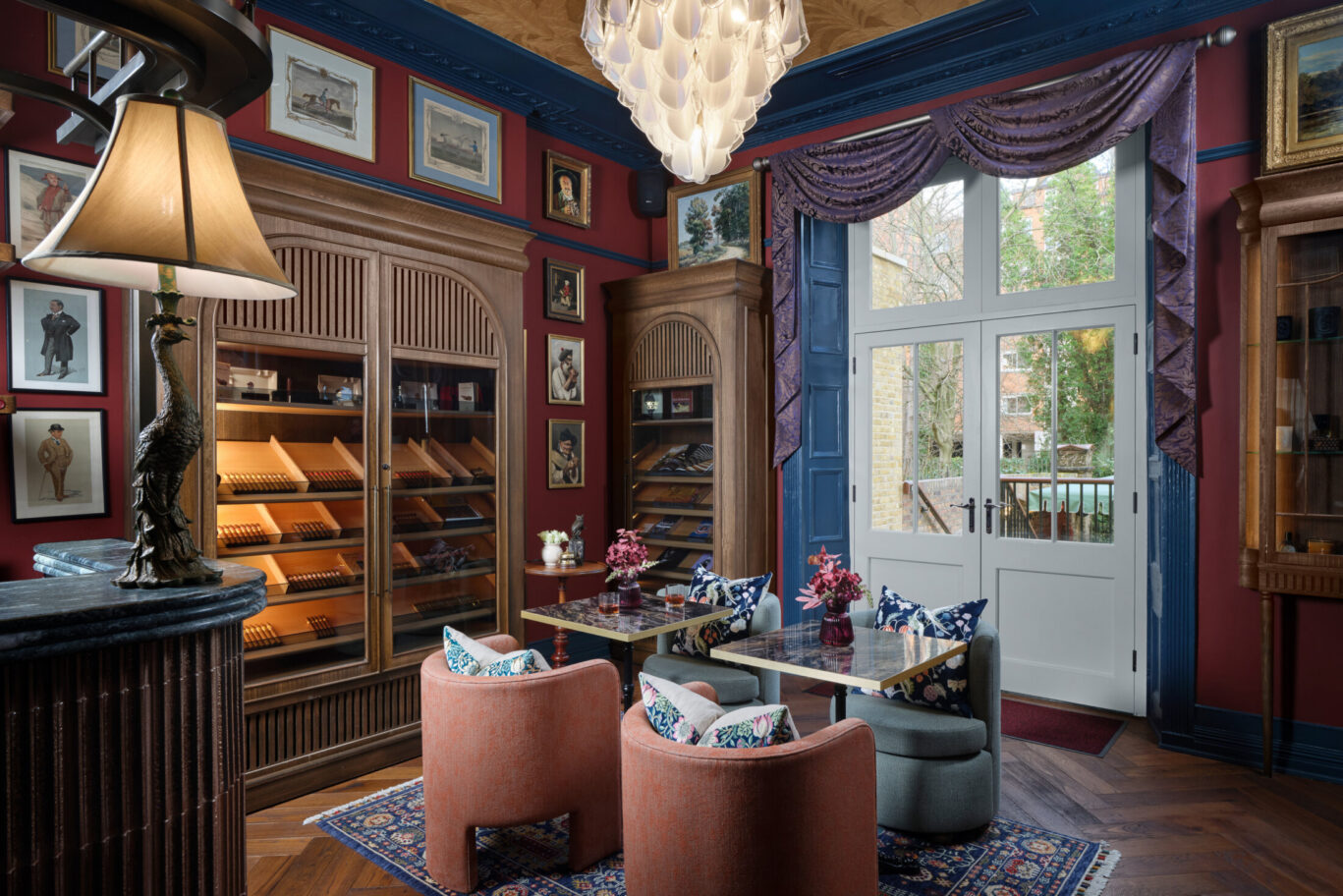 Ottie's Salon and Cigars with ornate lamps and a cigar cabinet