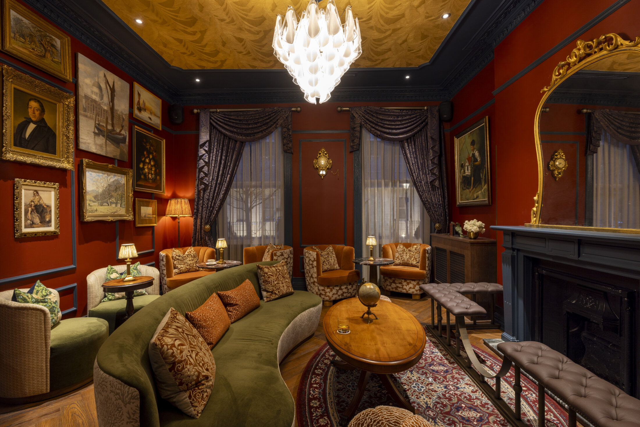 otties salon with gold frame images and green sofa