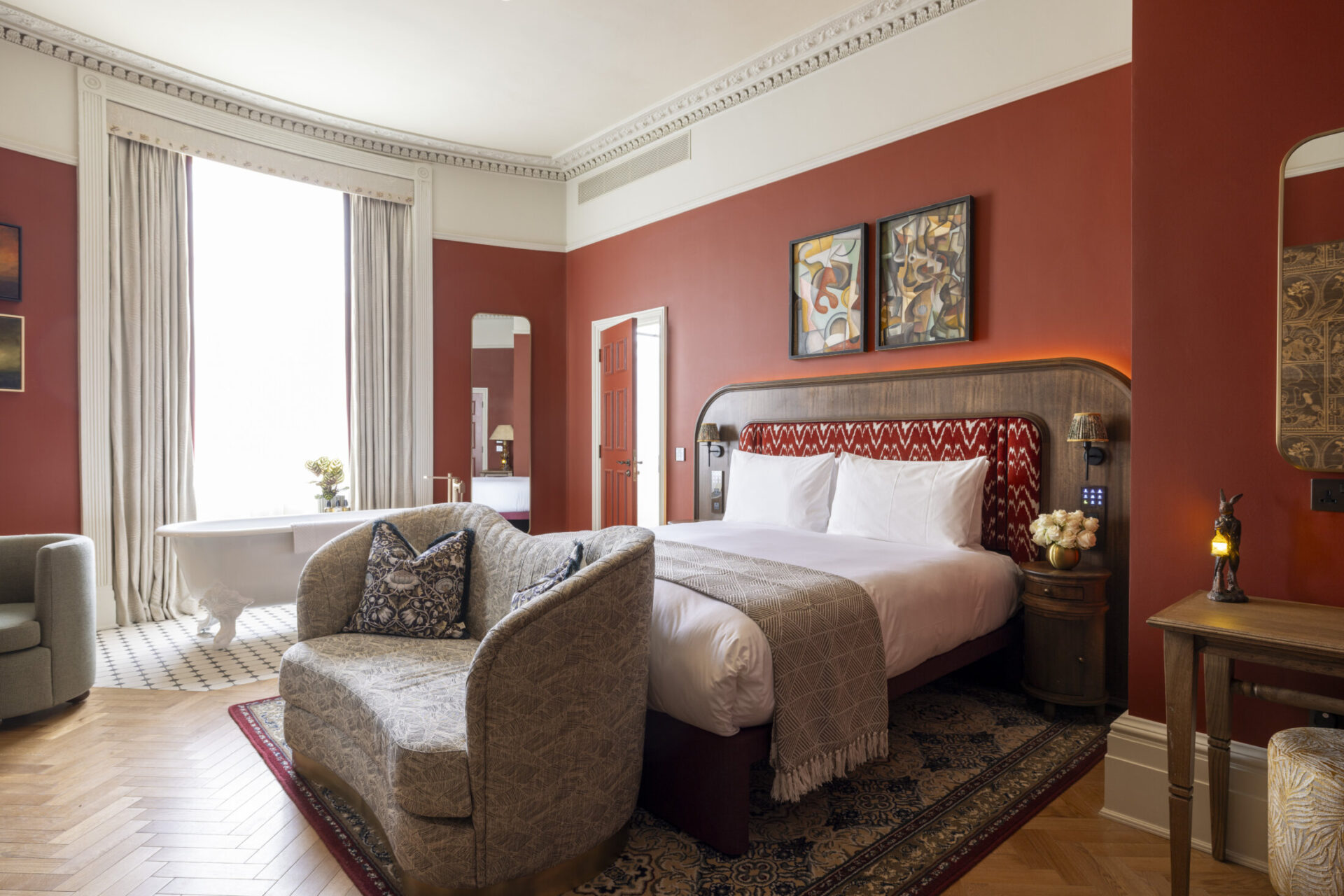 large roll top freestanding bath in hotel bedroom