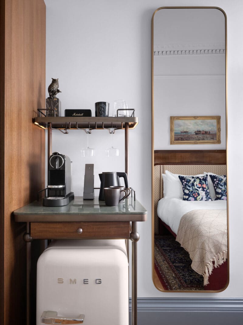 double bedroom in hotel with coffee station and tea