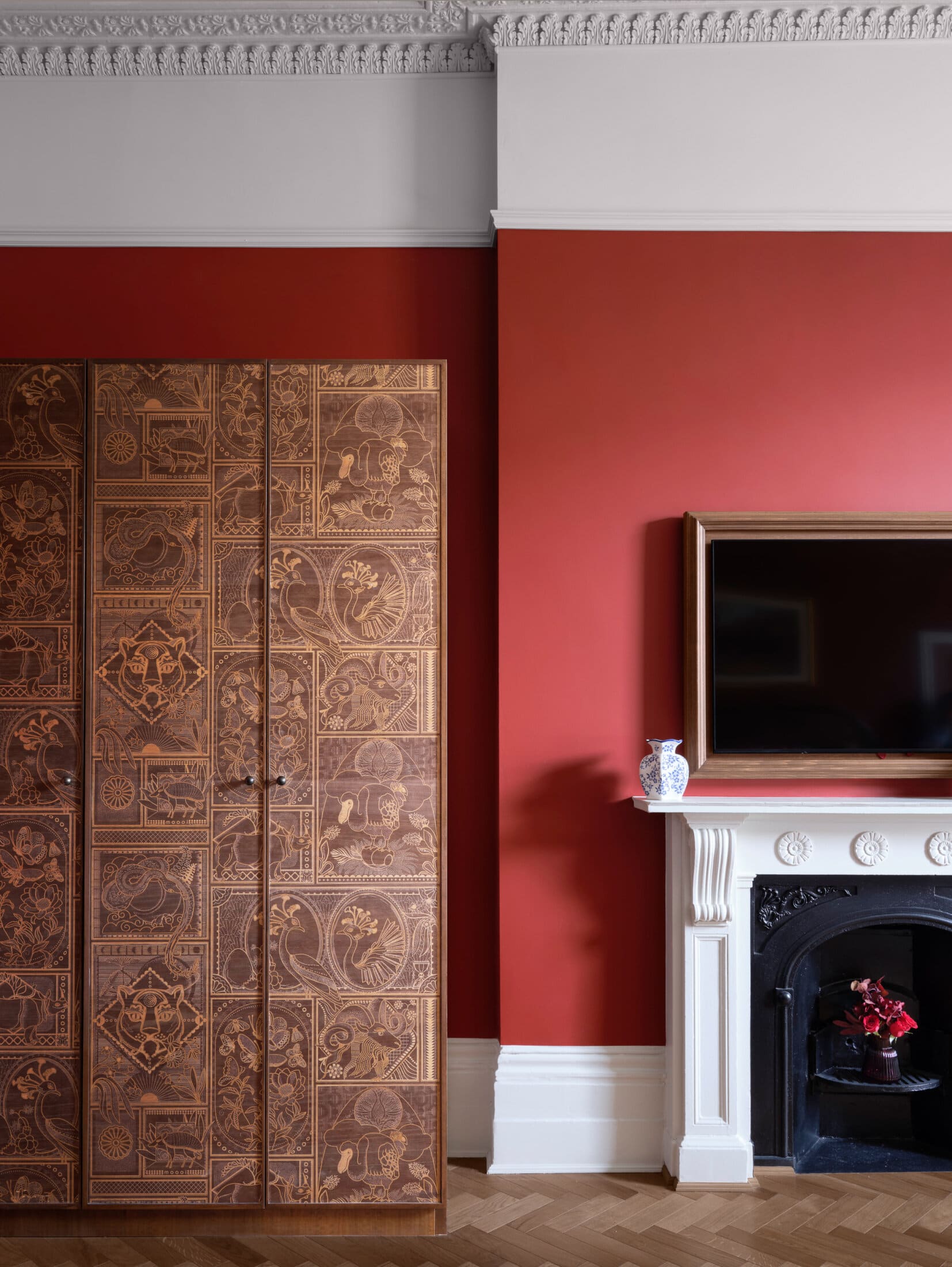 large suite hotel dark red walls with Japanese style wardrobe