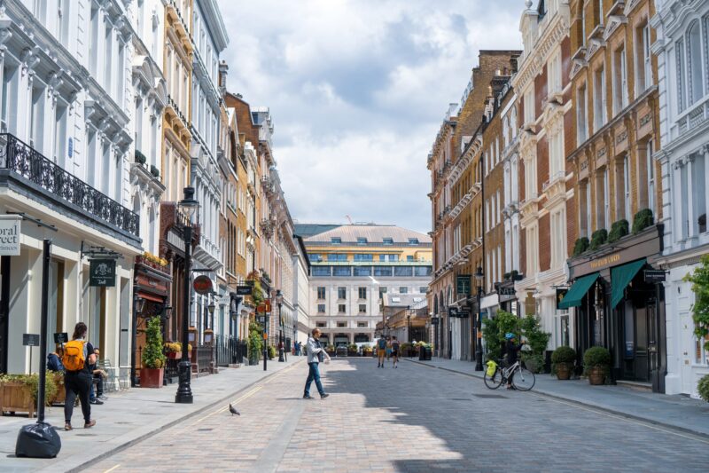 Covent Garden lit up on a sunny and overcast day.