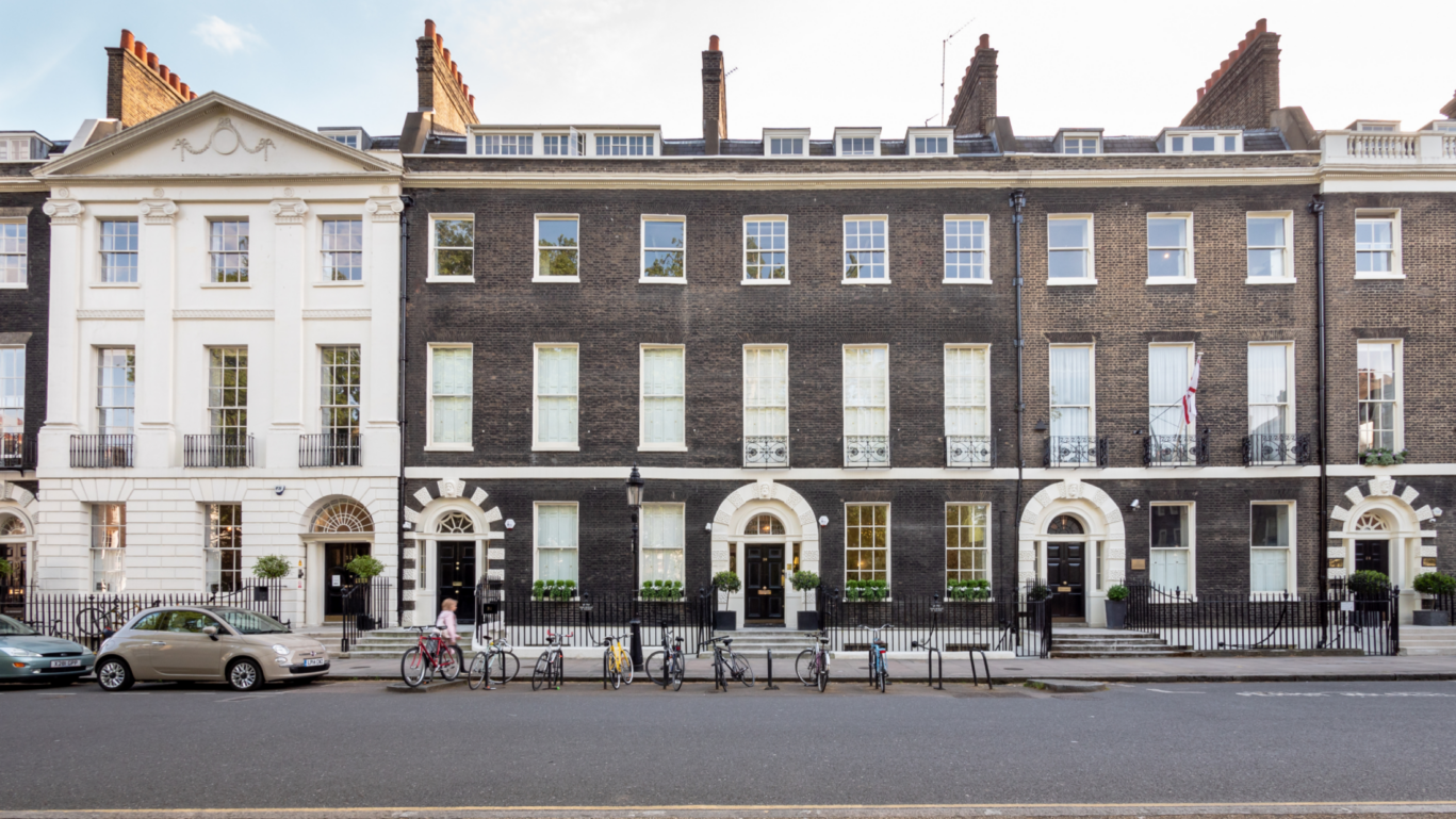 Georgian houses in Bloomsbury under a clear, bright sky.